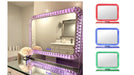 Bling vanity mirror lit in purple on a vanity, with red, blue and green light options