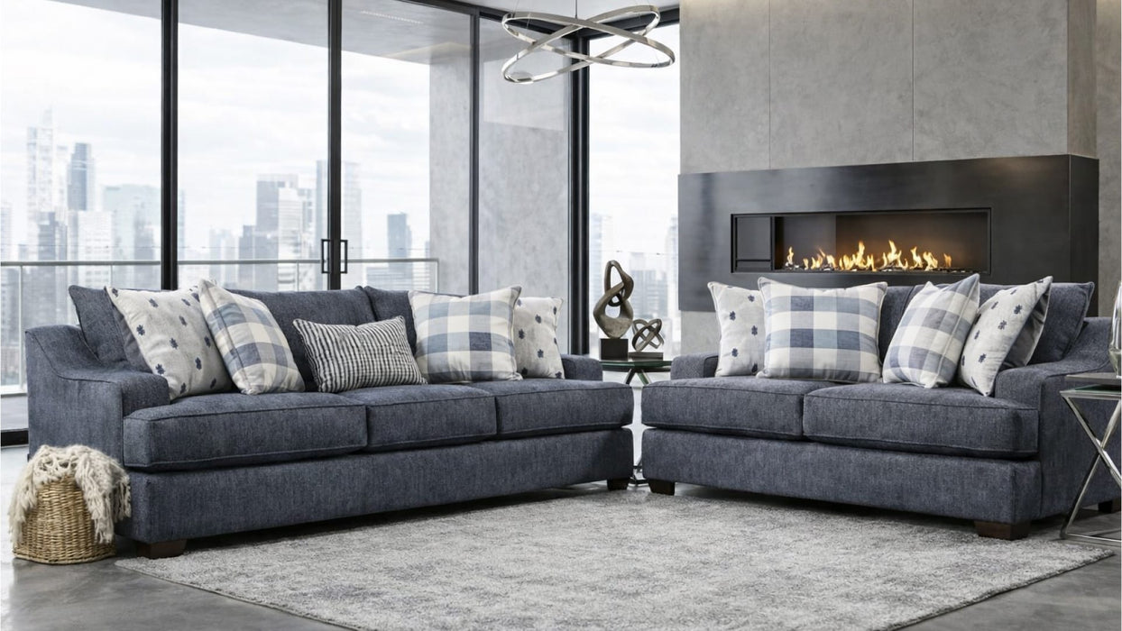 Bluesky blue sofa and loveseat staged in a modern living room with fireplace